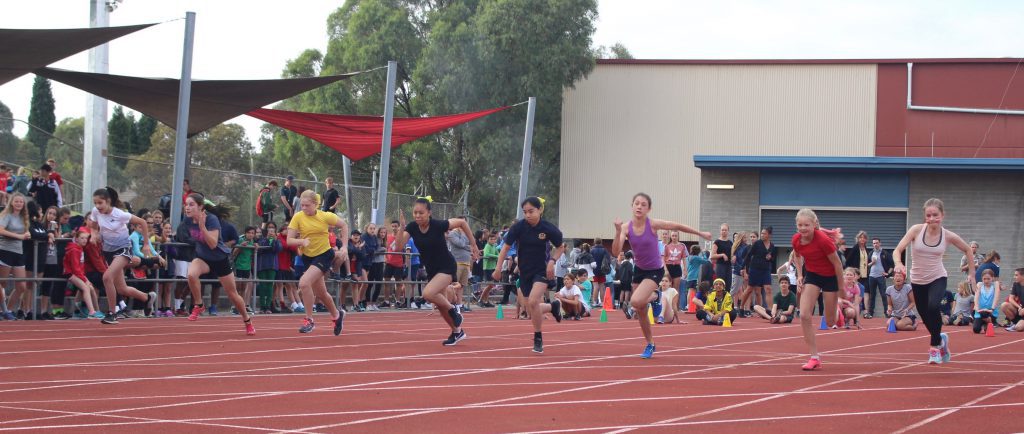 Students running at the annual sports carnival